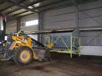 Fertilizer forklift feeding bin